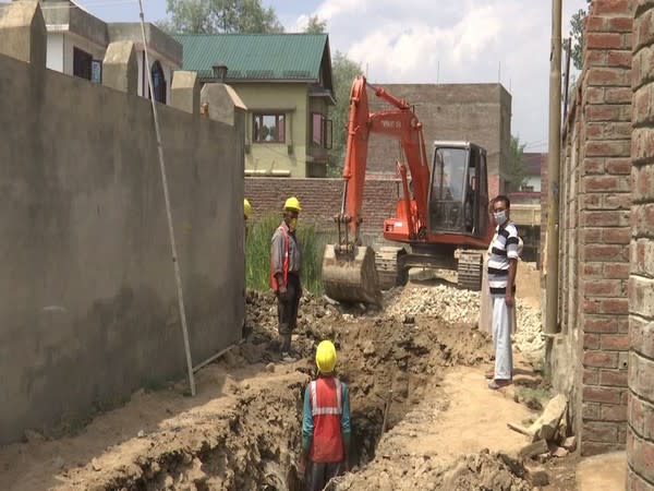 Construction of a new drainage system underway in Srinagar. (Photo/ANI)