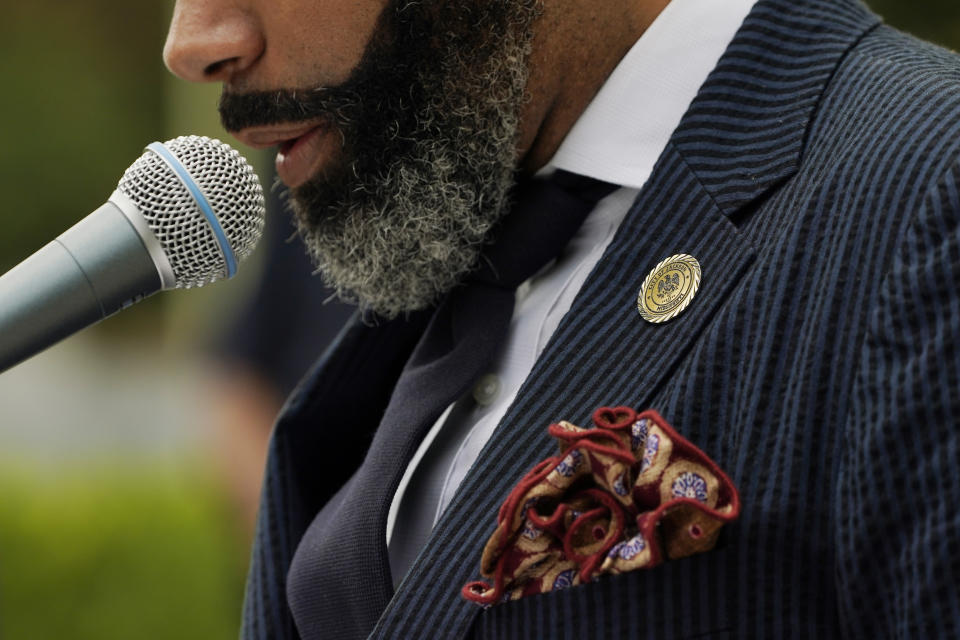 Known for his distinctive beard and sharp attire, Jackson, Miss., Mayor Chokwe Antar Lumumba speaks at a Tuesday, Sept. 6, 2022, news conference at City Hall, regarding updates on the ongoing water infrastructure issues. (AP Photo/Rogelio V. Solis)