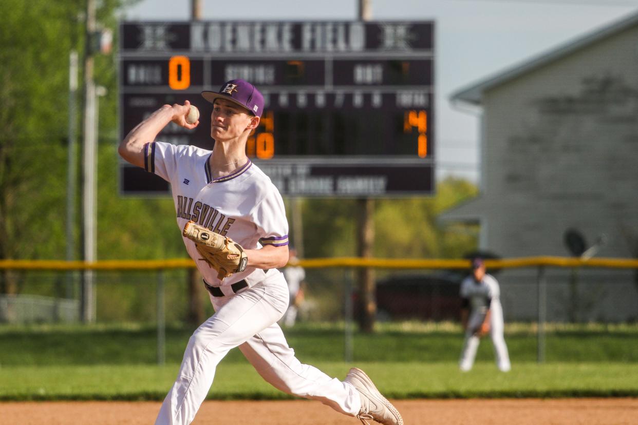 Hallsville's Brayden Nichols sends a pitch to the plate vs. Father Tolton on April 19.