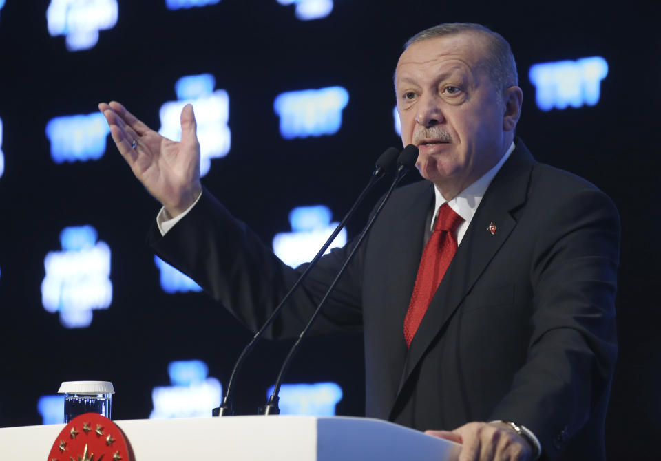 Turkish President Recep Tayyip Erdogan speaks at a forum organized by Turkish TRT World broadcaster, in Istanbul, Monday, Oct. 21, 2019. Erdogan has responded angrily to widespread criticism in the West of Turkey's incursion in northeast Syria.(Presidential Press Service via AP, Pool )