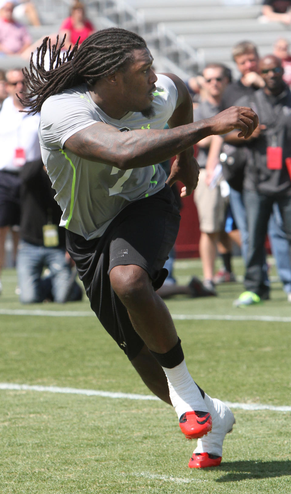 South Carolina defensive end Jadeveon Clowney competes in a drill for NFL representatives at South Carolina football pro day in Columbia, S.C., Wednesday, April 2, 2014. (AP Photo/Mary Ann Chastain)