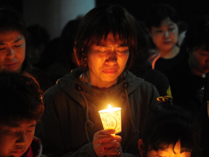 Trauer um die Toten und Vermissten des Fährunglücks. Foto: Yang Ji-Woong