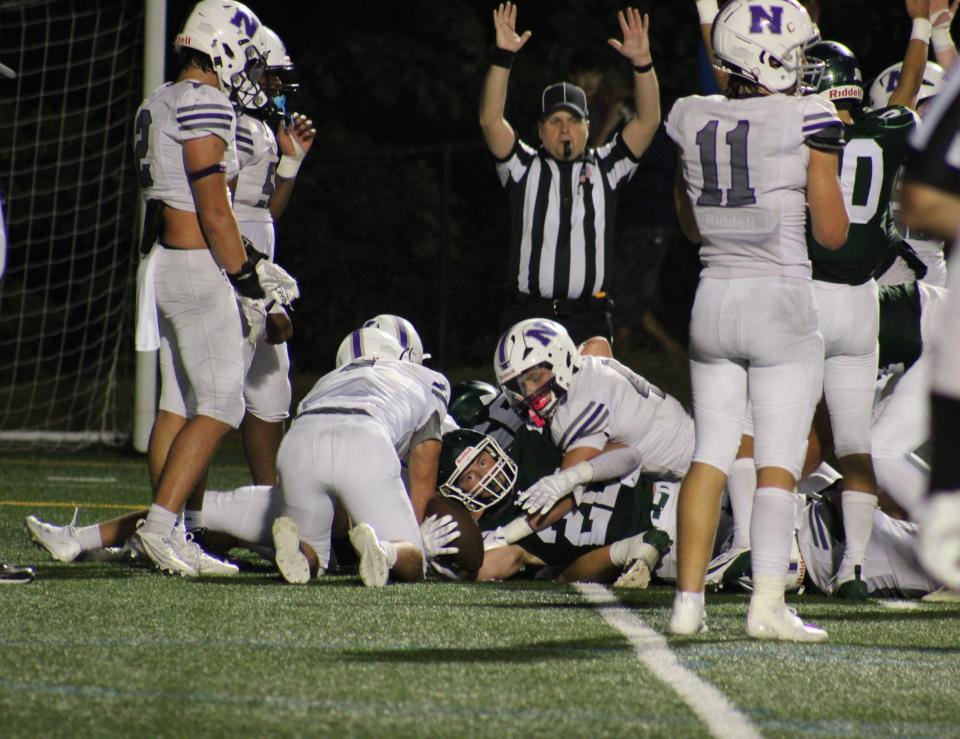 Oakmont's Harris Fagan reaches into the endzone for a touchdown against Norton on September 6, 2024.