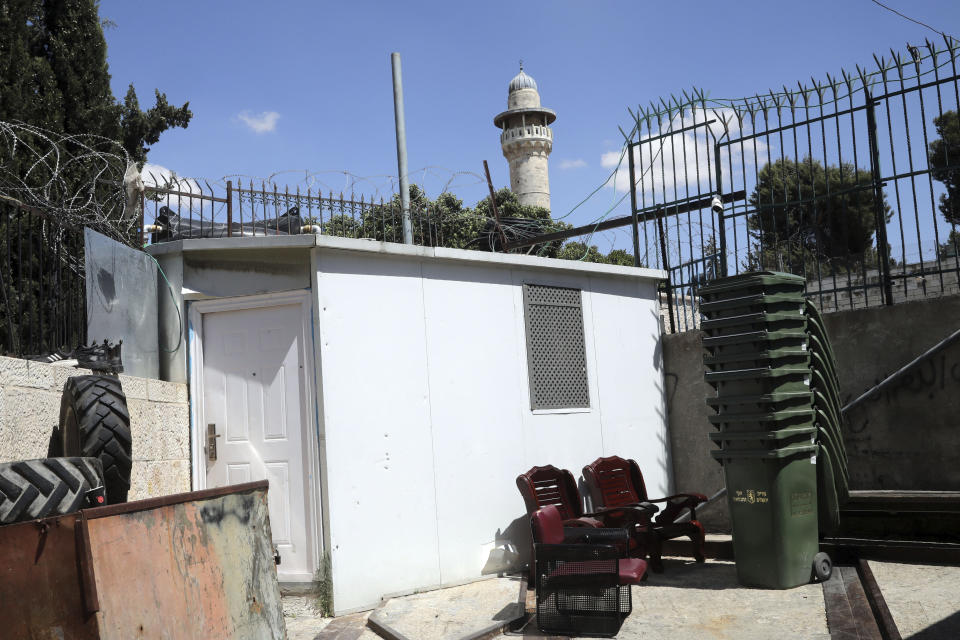 This Wednesday, June 3, 2020 photo shows bullet holes on a wall of a structure in Jerusalem's Old City where Eyad Hallaq was fatally shot. Early Saturday, Hallaq, a 32-year-old Palestinian with severe autism, was chased by Israeli border police forces into a nook in Jerusalem's Old City and fatally shot as he cowered next to a garbage bin after apparently being mistaken as an attacker. He was just a few meters from his beloved Elwyn El Quds school. (AP Photo/Mahmoud Illean)