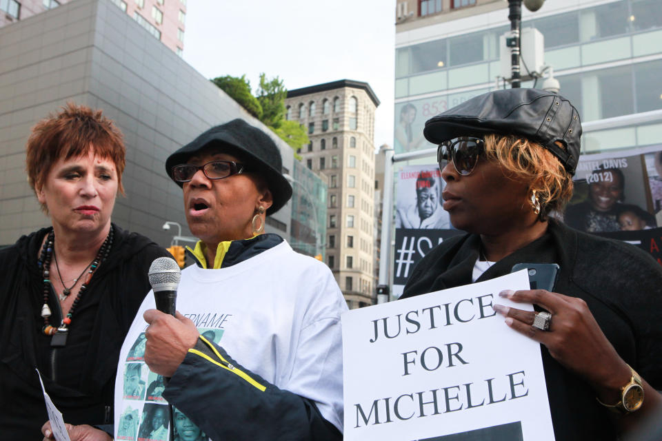 (From left to right) Eve Ensler with the Cusseaux family speaking for Michelle Cussaeux, lost to police violence.