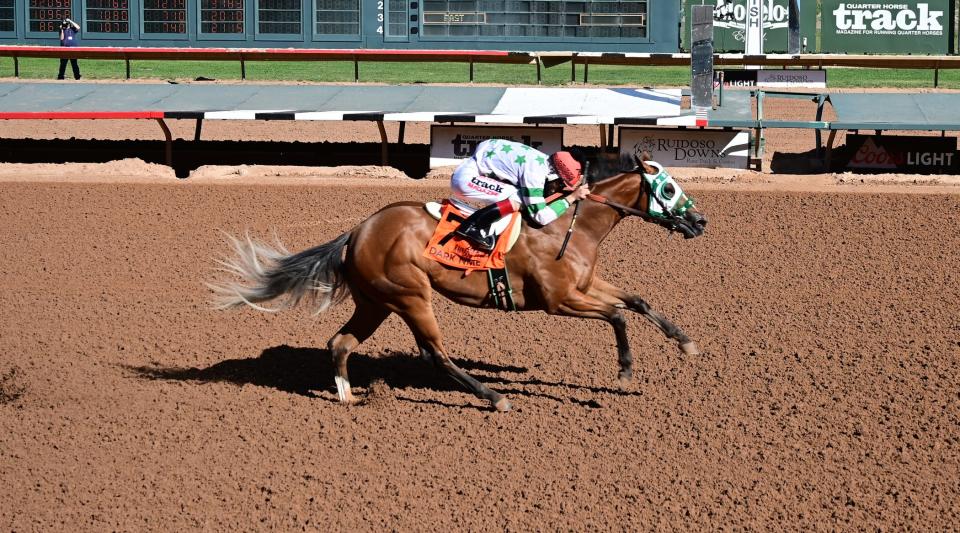 Dark Nme won the 400-yard Rainbow Futurity on Sunday at Ruidoso Downs Race Track and Casino in a record time of 19.028 seconds. The winning jockey was Francisco Calderon and the winning trainer was Santos Carrizales, Jr.