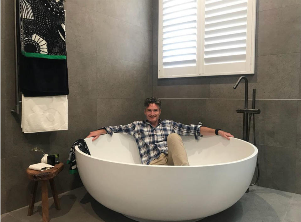 Dave Hughes in a bath