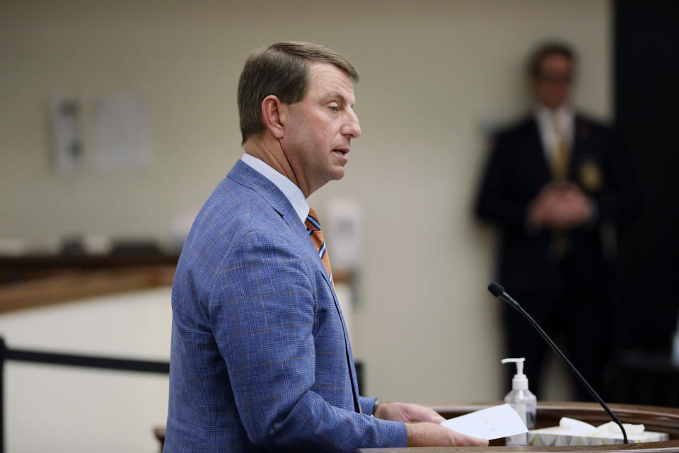 Clemson football coach Dabo Swinney speaks at a meeting of a South Carolina House committee considering a bill allowing schools to help athletes with name, image and likeness deals on Tuesday, Feb. 6, 2024, in Columbia, S.C. (AP Photo/Jeffrey Collins)