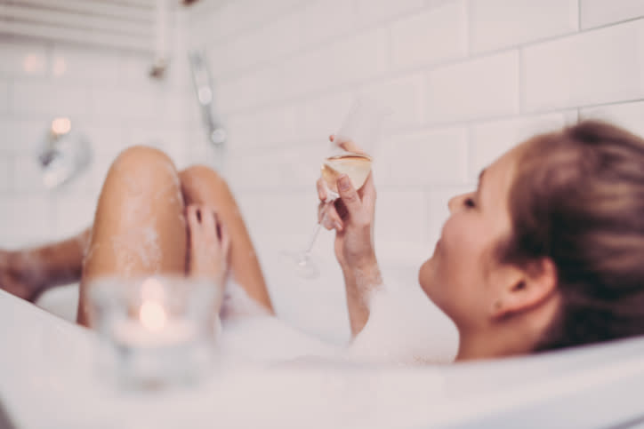 Just you, a bath and a glass of sparkling wine. [Photo credit: Guido Mieth | Getty Images]