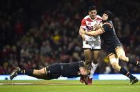 Britain Rugby Union - Wales v Japan - Principality Stadium, Cardiff, Wales - 19/11/16 Wales' Scott Baldwin (L) tackles Japan's Timothy Lafaele Reuters / Rebecca Naden Livepic