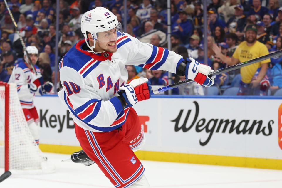 New York Rangers left wing Artemi Panarin (10) celebrates after his goal during the second period of an NHL hockey game against the Buffalo Sabres, Thursday, Oct, 12, 2023, in Buffalo, N.Y.