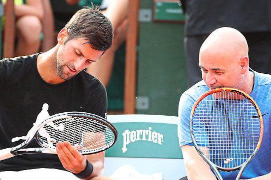 Master’s advice: Novak Djokovic with coach Andre Agassi: Corbis via Getty Images