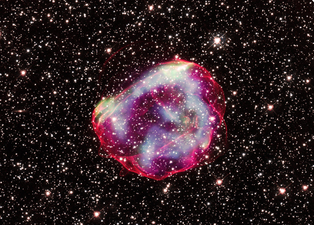  A composite image of the supernova remnant SNR 0519-69.0, created using data from NASA's Hubble and Chandra space telescopes. 