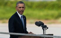 "The world was forever changed here," says US President Barack Obama as he speaks at the Hiroshima Peace Memorial Park on May 27, 2016