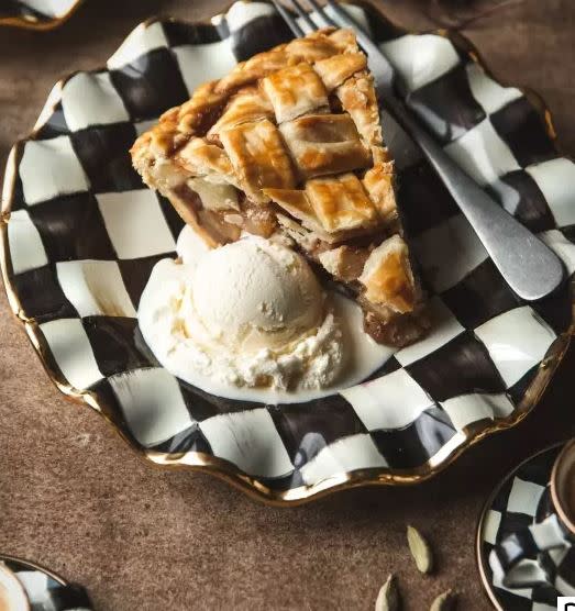 black and white checkerboard plate with pie and ice cream