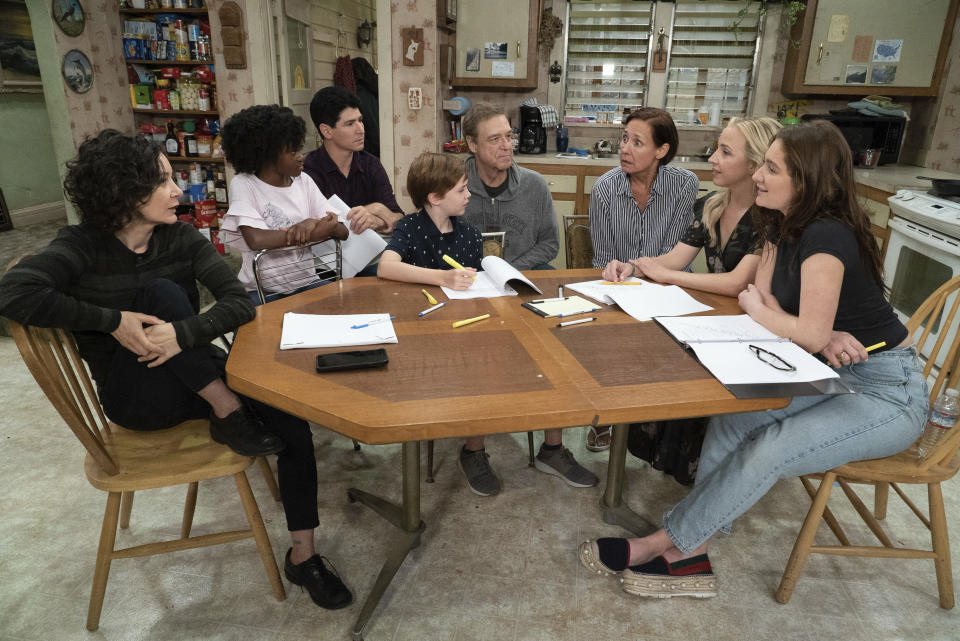 This image released by ABC shows, from left, Sara Gilbert, Jayden Rey, Michael Fishman, Ames McNamara, John Goodman, Laurie Metcalf, Lecy Goranson, and Emma Kenney in a scene from “The Connors,” premiering Oct. 16. (Photo: Eric McCandless/ABC via AP)