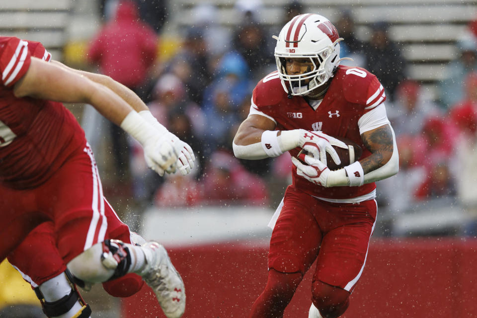 Nov 5, 2022; Madison, Wisconsin, USA; Wisconsin Badgers running back Braelon Allen (0) rushes with the football during the first quarter against the Maryland Terrapins at Camp Randall Stadium. Mandatory Credit: Jeff Hanisch-USA TODAY Sports