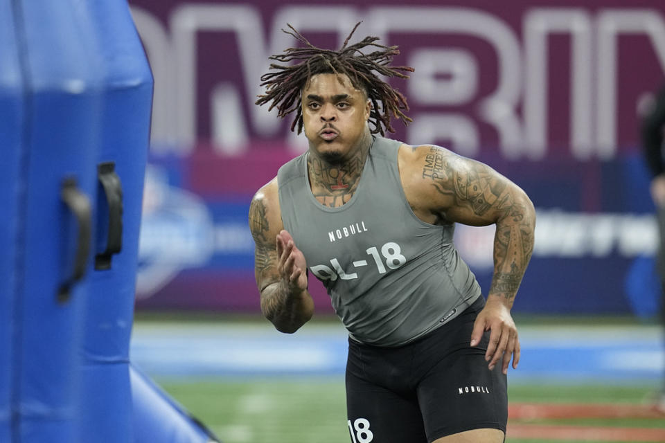 Texas defensive lineman Byron Murphy runs a drill at the NFL football scouting combine, Thursday, Feb. 29, 2024, in <a class="link " href="https://sports.yahoo.com/nfl/teams/indianapolis/" data-i13n="sec:content-canvas;subsec:anchor_text;elm:context_link" data-ylk="slk:Indianapolis;sec:content-canvas;subsec:anchor_text;elm:context_link;itc:0">Indianapolis</a>. (AP Photo/Darron Cummings)