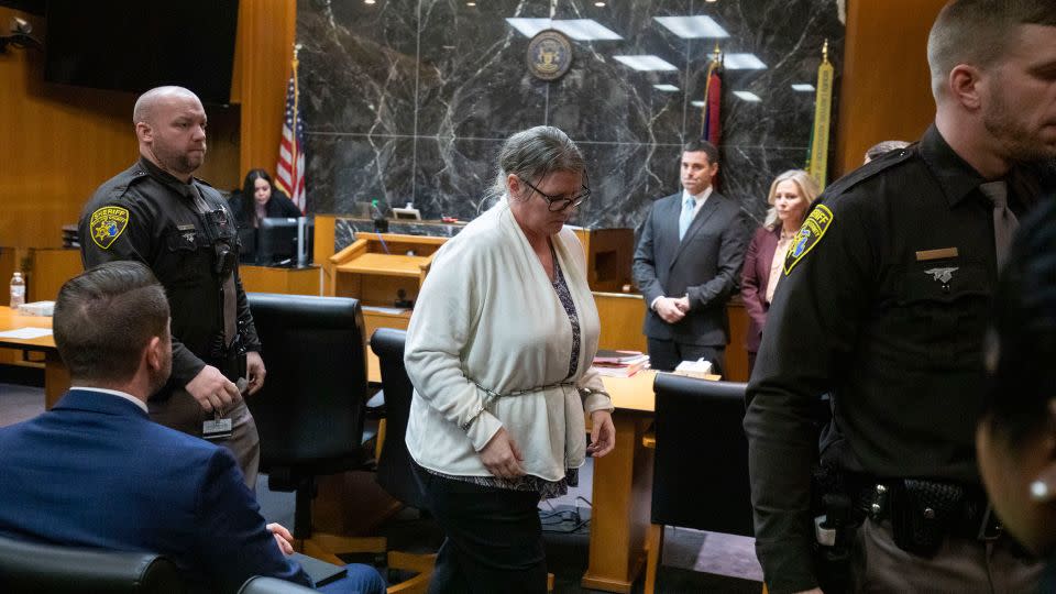 Jennifer Crumbley exits from the courtroom in shackles on Tuesday after her guilty verdict. - Bill Pugliano/Getty Images