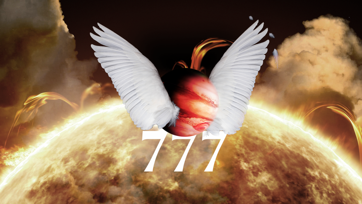 the number 777 under a winged planet