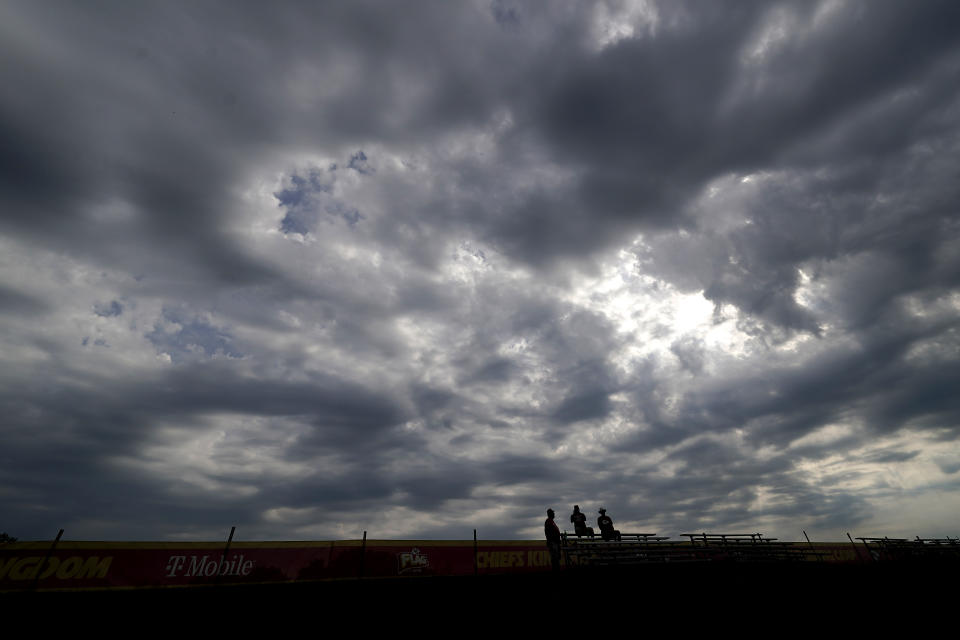 Fans wait for the Kansas City Chiefs to practice during NFL football training camp Monday, Aug. 15, 2022, in St. Joseph, Mo. (AP Photo/Charlie Riedel)