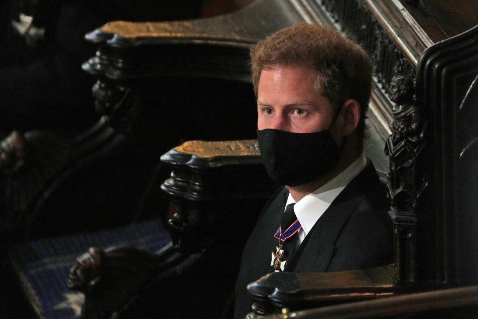 Britain's Prince Harry, Duke of Sussex attends the funeral service of Britain's Prince Philip, Duke of Edinburgh at St George's Chapel at Windsor Castle, Windsor, west of London, on April 17, 2021. - Philip, who was married to Queen Elizabeth II for 73 years, died on April 9 aged 99 just weeks after a month-long stay in hospital for treatment to a heart condition and an infection. (Photo by Yui Mok / POOL / AFP) (Photo by YUI MOK/POOL/AFP via Getty Images)