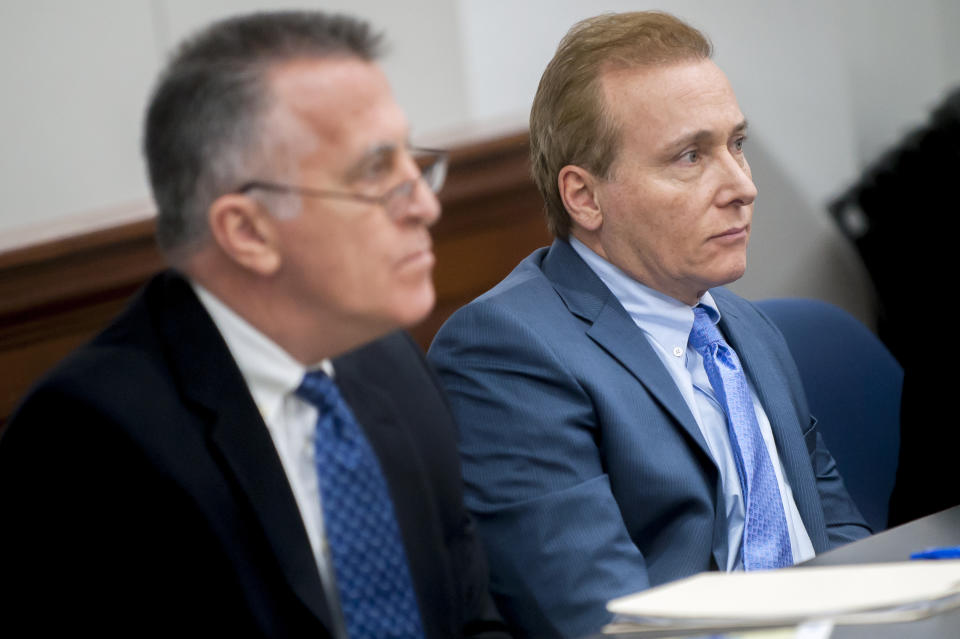 Rene Boucher, right, and his attorney Matt Baker listen to questions Monday, Jan. 28, 2019, during jury selection in a civil trial in Warren Circuit Court in Bowling Green, Ky. Republican U.S. Sen. Rand Paul is suing Boucher, who broke Paul's ribs with a hard tackle while he was doing yard work at his Kentucky home in 2017. (Bac Totrong/Daily News via AP)