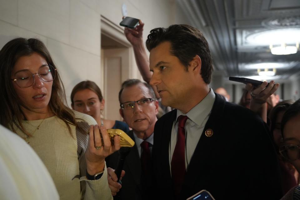 Rep. Matt Gaetz, R-Fla.,followed by reporters at the Capitol in Washington, Tuesday, Oct. 10, 2023.