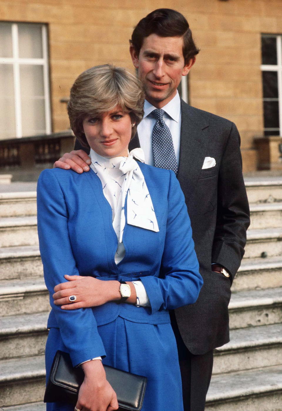 LONDON, UNITED KINGDOM - FEBRUARY 24:  Lady Diana Spencer Reveals Her Sapphire And Diamond Engagement Ring While She And Prince Charles Pose For Photographs In The Grounds Of Buckingham Palace Following The Announcement Of Their Engagement.  (Photo by Tim Graham Photo Library via Getty Images)