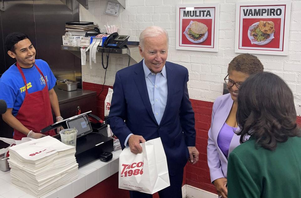 President Joe Biden with mayoral candidate Rep. Karen Bass, center, and L.A. County Supervisor Hilda Solis.
