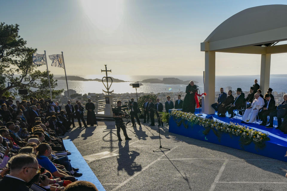 Pope Francis takes part in a moment of reflection with religious leaders next to the Memorial dedicated to sailors and migrants lost at sea, in Marseille, France, Friday, Sept. 22, 2023. Francis, during a two-day visit, will join Catholic bishops from the Mediterranean region on discussions that will largely focus on migration. (AP Photo/Pavel Golovkin)