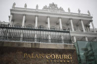 Snow falls on the Palais Coburg where closed-door nuclear talks take place in Vienna, Austria, Thursday, Dec. 09, 2021. (AP Photo/Michael Gruber)