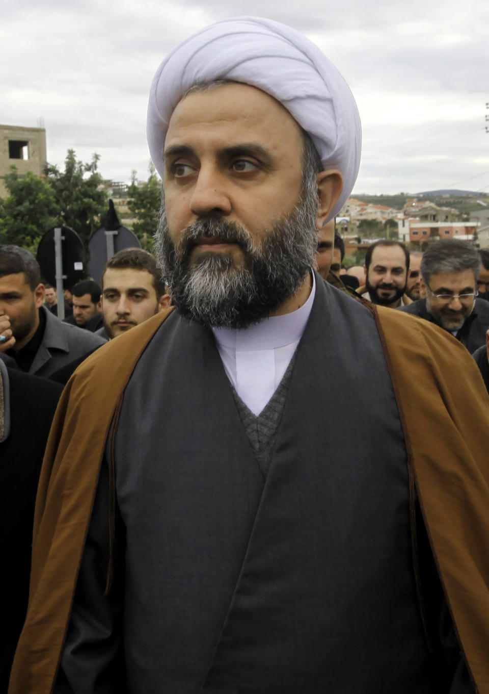 In this January 26, 2010, Sheik Nabil Qaouk a member of Hezbollah's Central Council, attends the funeral of prominent businessman Hassan Tajeddine in the southern village of Hanaway, Lebanon. On Friday, Oct. 23, 2020, the U.S. Treasury has sanctioned two high-ranking Hezbollah officials, Nabil Qaouk and Hassan al-Baghdadi, both members of Hezbollah's Central Council. The Council is responsible for electing members of the group's top decision-making body, the Shura Council. (AP Photo/Hussein Malla)