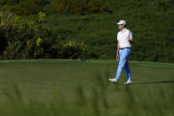 Patrick Cantlay walks off the green after making birdie on the 11th hole during the second round of the Tournament of Champions golf event, Friday, Jan. 7, 2022, at Kapalua Plantation Course in Kapalua, Hawaii. (AP Photo/Matt York)