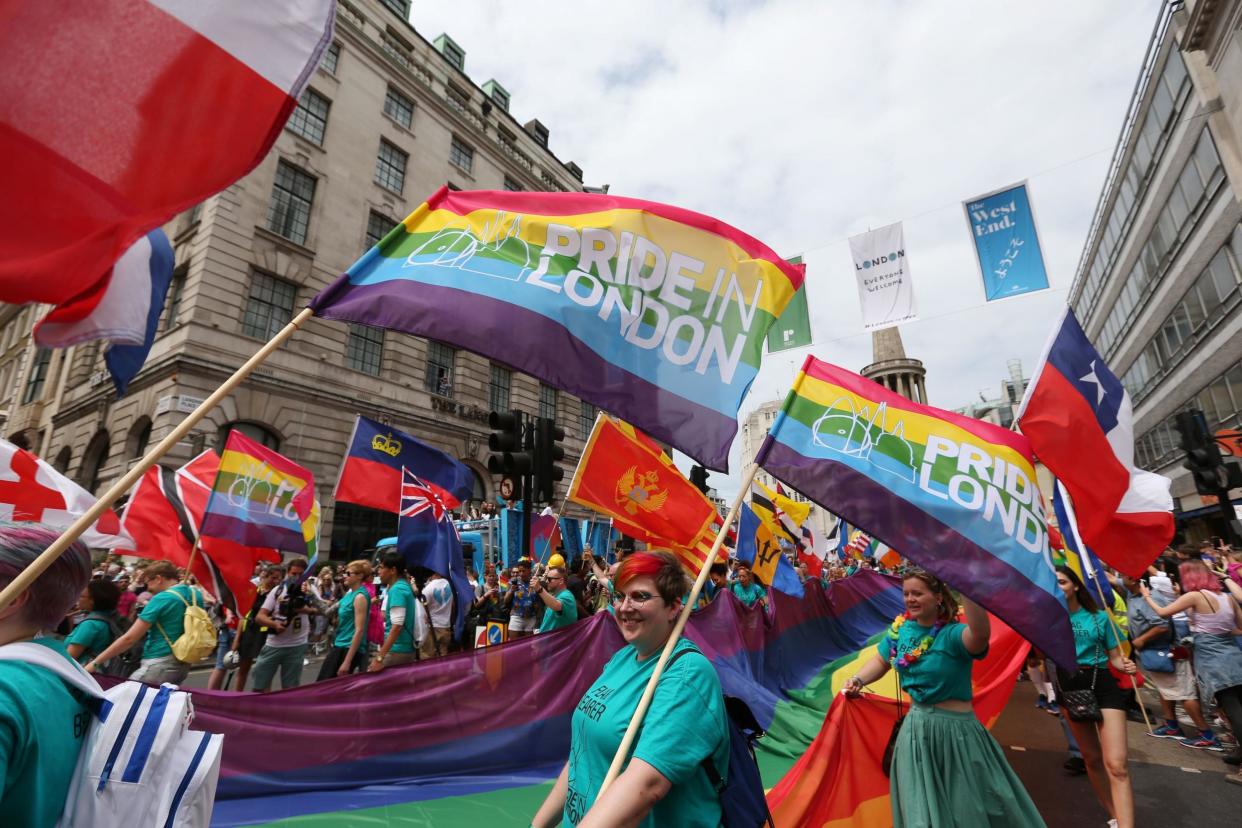 Londoners gather to take part in the Pride parade on the capital's streets: PA