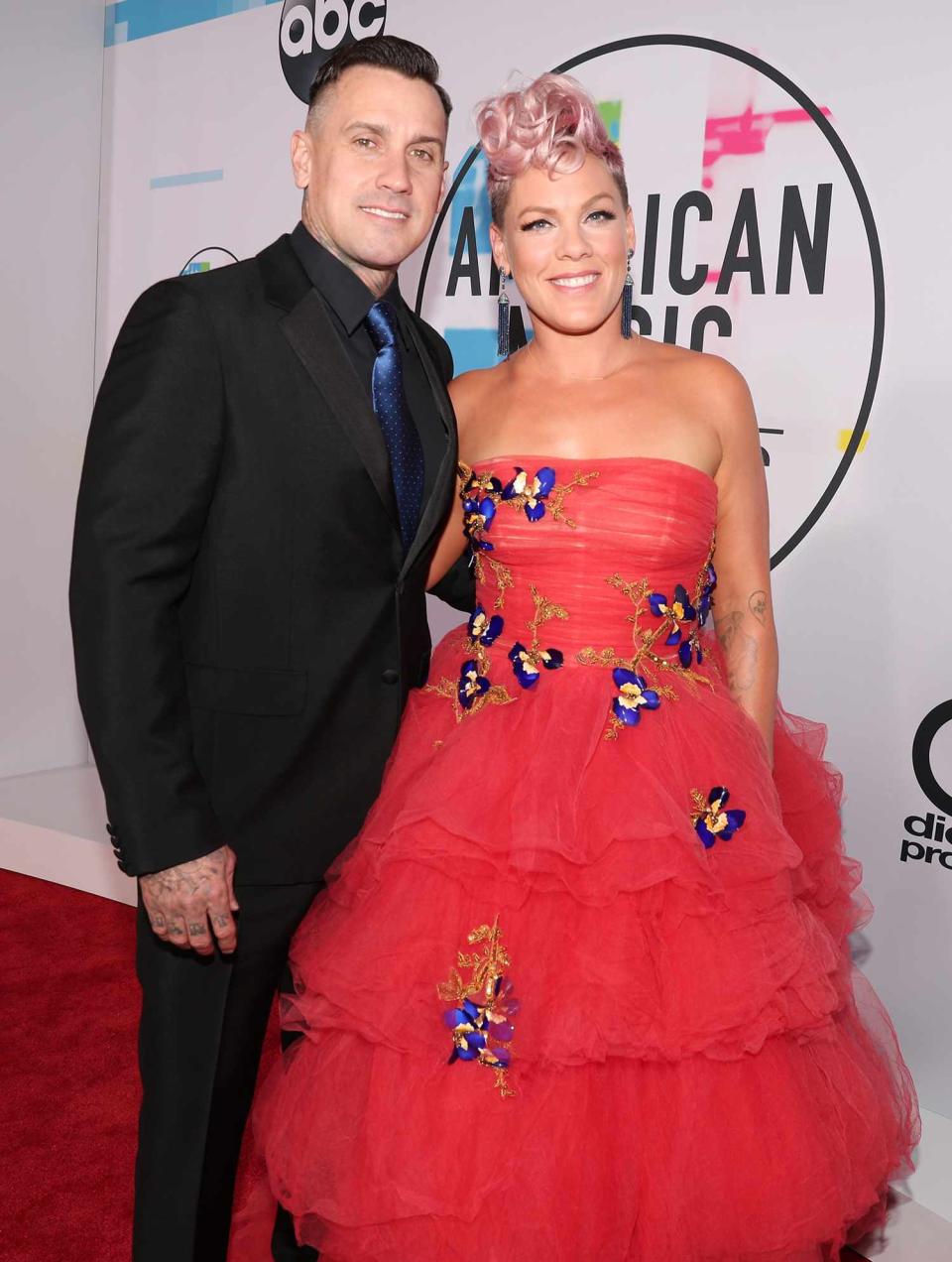 Carey Hart (L) and Pink attend the 2017 American Music Awards at Microsoft Theater on November 19, 2017 in Los Angeles, California