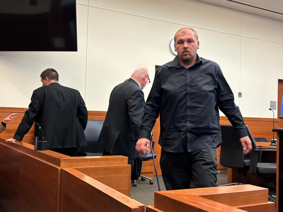 Krieg Butler, 37, formerly of the Hilltop neighborhood, leaves a Franklin County Common Pleas courtroom on Dec. 4, 2023, after he appeared for a bond hearing at which Judge Andy Miller modified Butler's bond to take him off home confinement.