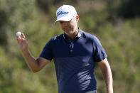 Matt Jones waves after finishing the final round of the Tournament of Champions golf event, Sunday, Jan. 9, 2022, at Kapalua Plantation Course in Kapalua, Hawaii. (AP Photo/Matt York)