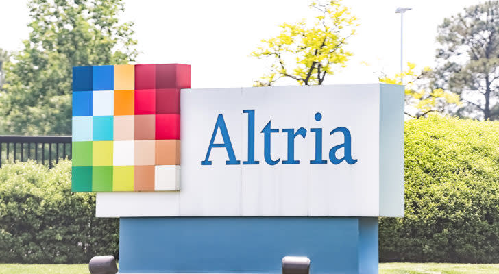 Altria office sign in Virginia capital city tobacco business closeup by road street