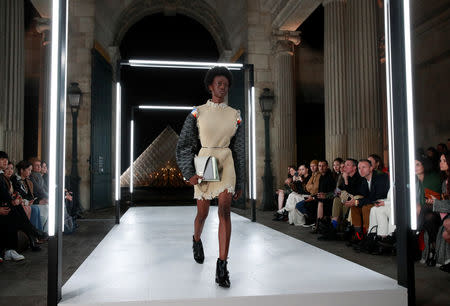 A model displays a creation by French fashion designer Nicolas