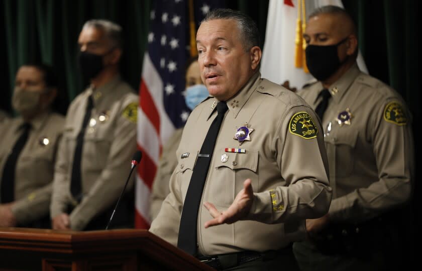 LOS ANGELES, CA - MAY 26: Los Angeles County Sheriff Alex Villanueva discusses organizational change, transparency, accountability and how they relate to the issue of deputy cliques during a press conference at the Hall of Justice Wednesday May 26, 2021. The Sheriff also addressed a damages claim filed by the city of Compton against Los Angeles County today, alleging the sheriff's department has bilked the city out of millions of dollars by falsely reporting the amount of time deputies spend patrolling the city. Sheriff Alex Villanueva dismissed the allegations. "We have about 45 contracts and we measure the minutes, and there's a rate -- we have to get close to 100%, either slightly above or slightly below,'' Villanueva said. "If we're missing that target, I don't think it's going to be the grand conspiracy that the outgoing mayor of Compton wants it to be. "But we'll definitely take the allegation seriously, and we are already doing a thorough audit on it, and we'll take action based on the results of that. Nothing unusual there. But to call it a fraud, that might be a little bit of a stretch.'' Hall of Justice on Wednesday, May 26, 2021 in Los Angeles, CA. (Al Seib / Los Angeles Times).