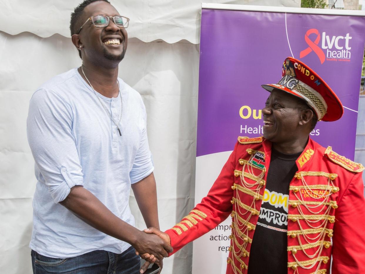 Kenyan pop star Tetu Shani, left, with 'King of Condoms', Stanley Ngara: Jan Husar