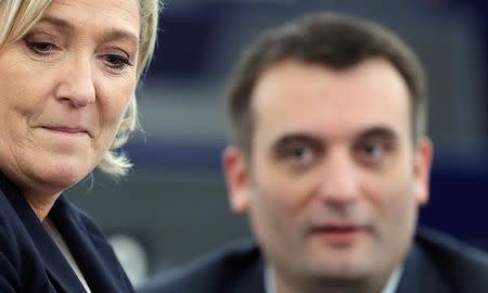 Marine Le Pen (L), French National Front (FN) political party leader and Member of the European Parliament, and fellow MEP and FN vice-president Florian Philippot attend the election of the new President of the European Parliament in Strasbourg, France, January 17, 2017. REUTERS/Christian Hartmann