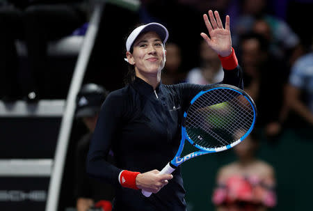 Tennis - WTA Tour Finals - Singapore Indoor Stadium, Singapore - October 22, 2017 Spain's Garbine Muguruza celebrates winning her group stage match against Latvia's Jelena Ostapenko REUTERS/Edgar Su