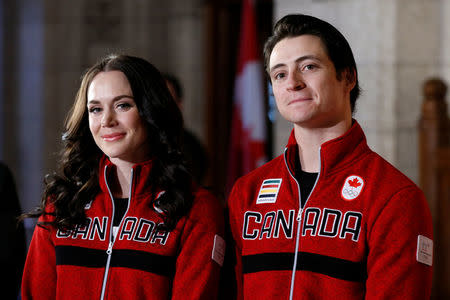Ice dancers Tessa Virtue and Scott Moir react while being named Canada's flag-bearers for the opening ceremony of the 2018 Pyeongchang Winter Olympic Games during an event on Parliament Hill in Ottawa, Ontario, Canada, January 16, 2018. REUTERS/Chris Wattie