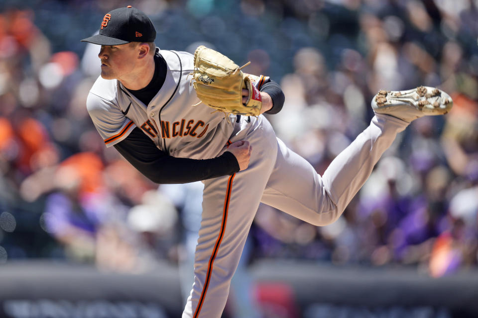 San Francisco Giants starting pitcher Logan Webb works against the Colorado Rockies in the first inning of a baseball game Wednesday, May 18, 2022, in Denver. (AP Photo/David Zalubowski)