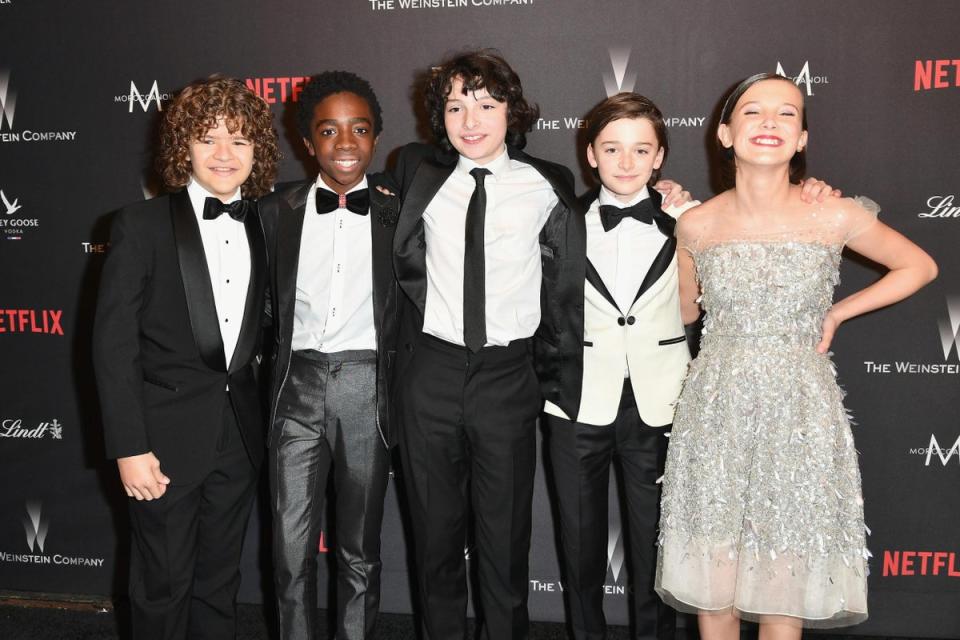 Stranger Things stars (L-R)  Gaten Matarazzo, a 15-year-old Caleb McLaughlin,  Finn Wolfhard, Noah Schnapp and  Millie Bobby Brown at Netflix Golden Globe Party in  2017 (Getty Images)