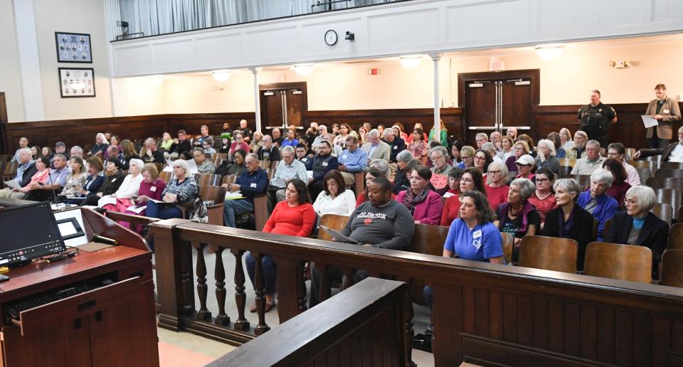 A crowd gathers before the Anderson County Council meeting in the Historic Courthouse in Downtown Anderson, S.C. Tuesday, March 5, 2024. One of the ordinances, 2024-010, "An Ordinance to amend second 28-48 of the Code of Ordinances, Anderson County, South Carolina, to provide for two at-large members to the Anderson County Library Board of Trustees: and other matters related thereto," with public hearing three minute limit. The ordinance already passed two readings in earlier meetings.