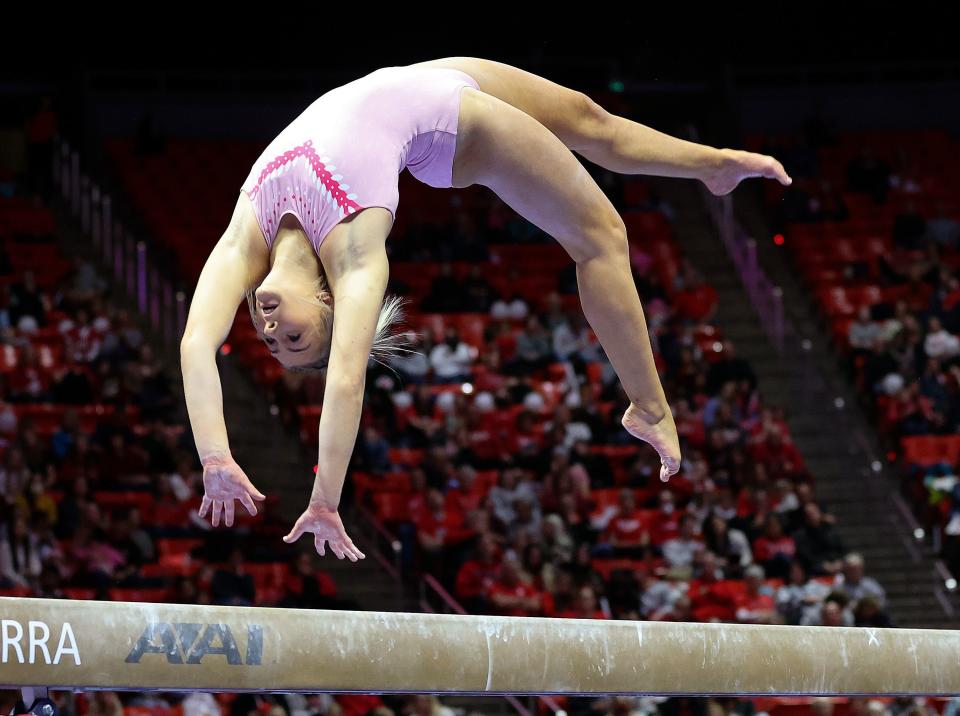 Lucy Stanhope does her beam routine during the University of Utah Red Rocks gymnastics preview at the Huntsman Center in Salt Lake City on Friday, Dec. 9, 2022. | Kristin Murphy, Deseret News