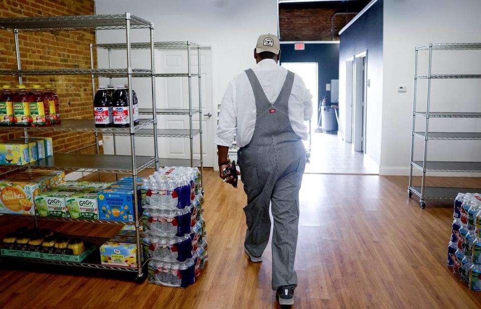 David Howard walks through an event space he is working to convert into a SNAP and EBT grocery store on Wednesday, April 17, 2024. He also envisions a co-working space open to Texas Wesleyan students.